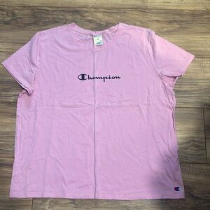 NWOT. Woman’s 2XL pink champion short sleeve T shirt.